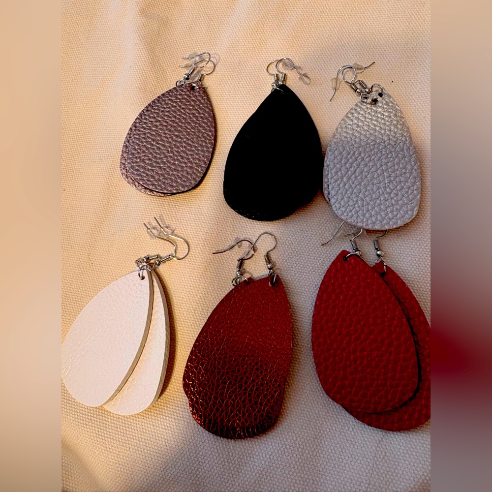 Six pairs of leather earrings